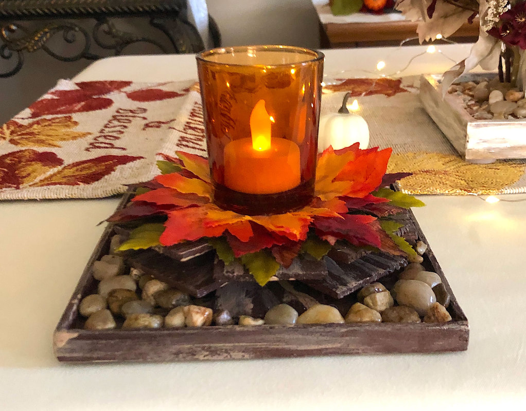 Autumn themed handcrafted candleholder with faux leaves and LED candle.
