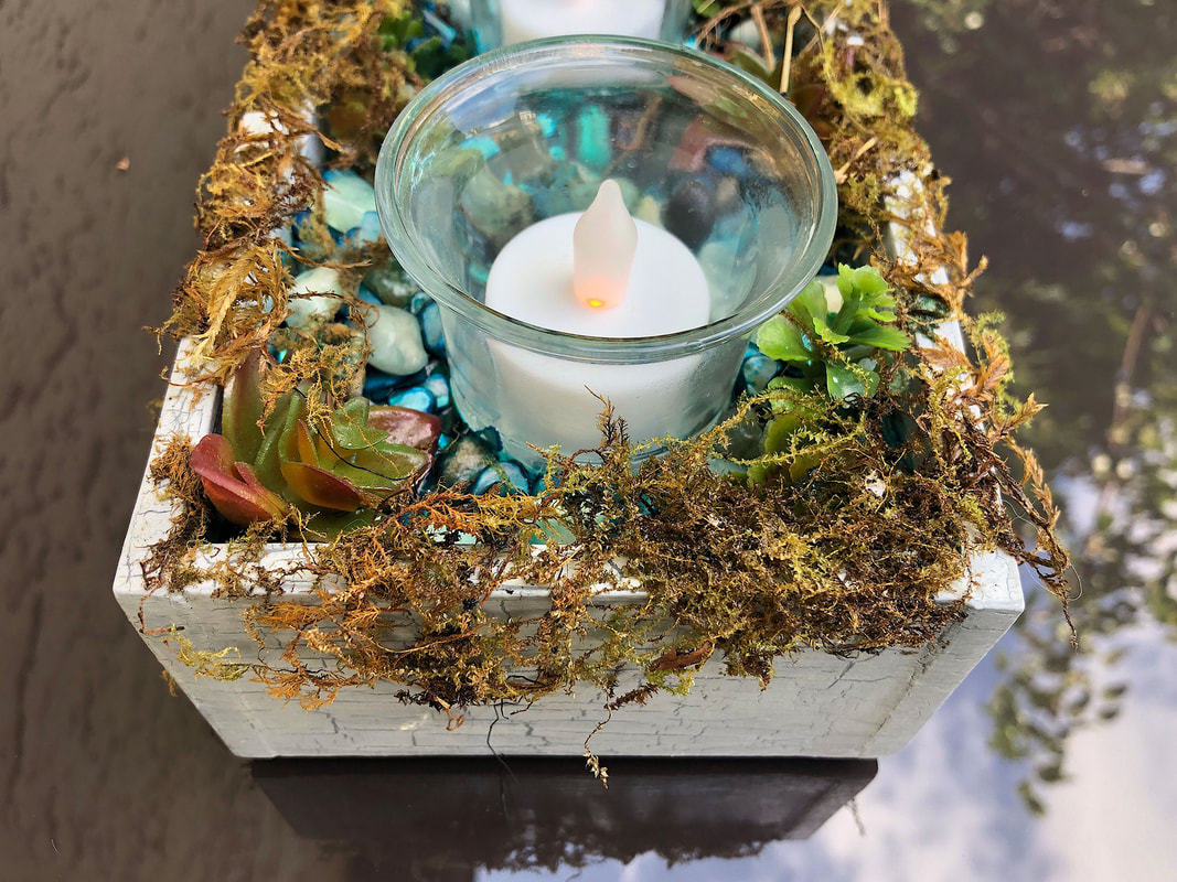 Image of a handcrafted nature inspired waterfall themed candleholder by Di's Studio Designs. 