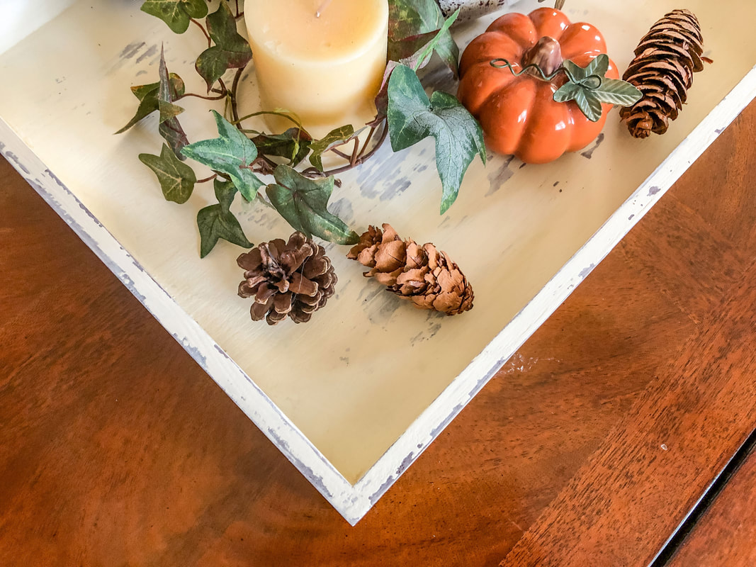 DIY weathered decorative tray staged with fall decor.