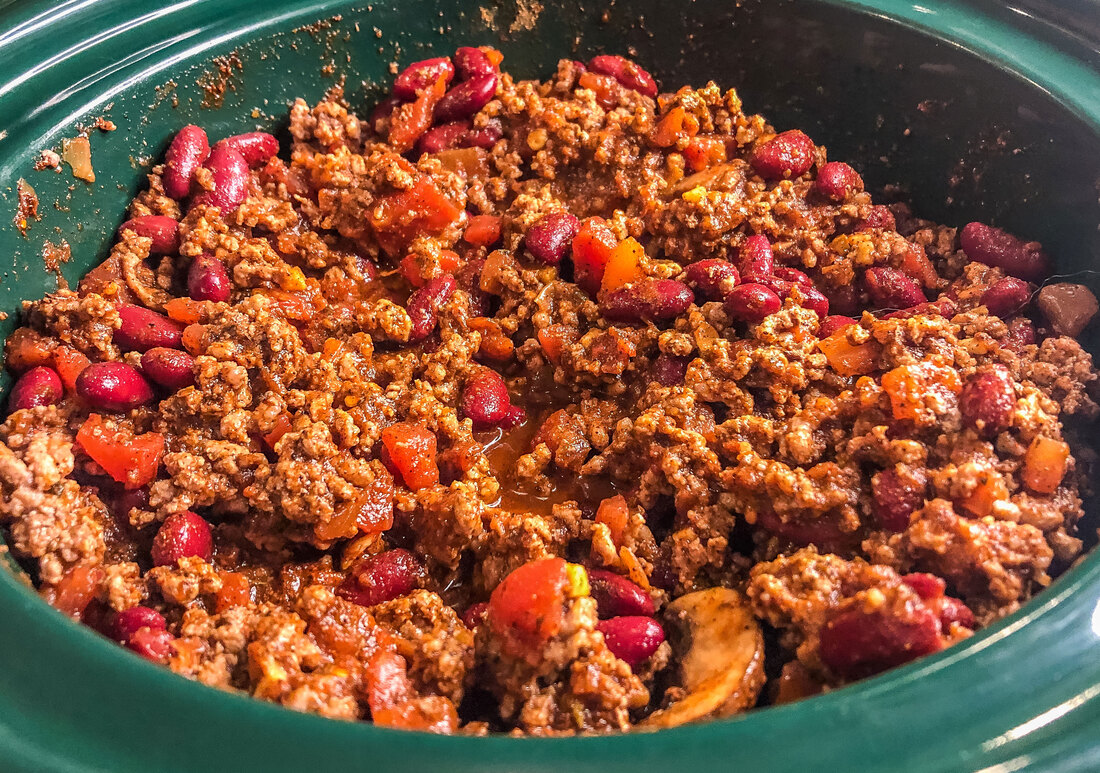 Cooked chili in crockpot.