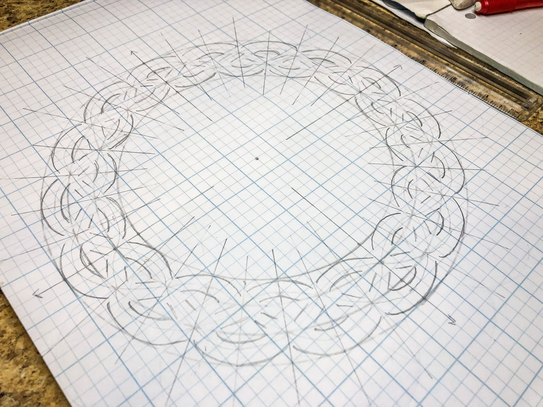 Circular Celtic knot outline on grid paper.