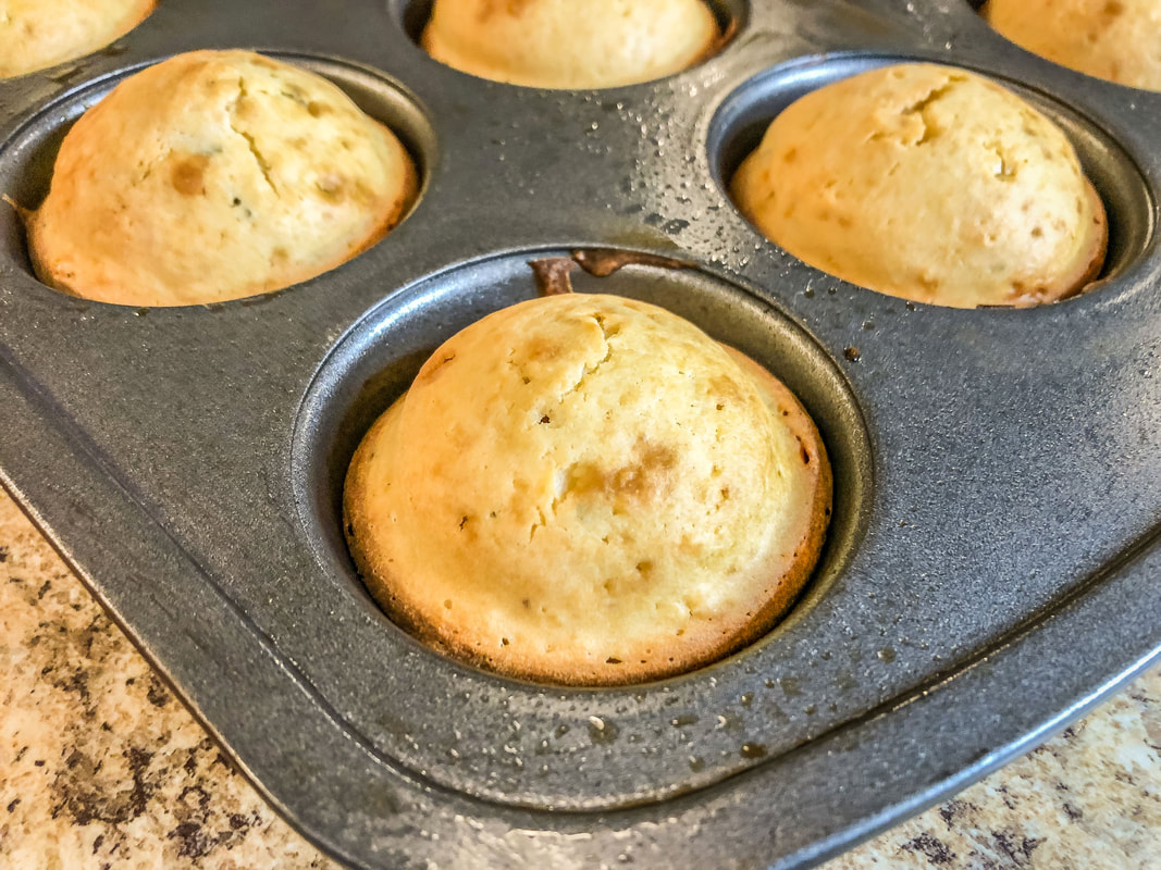 Closeup of freshly baked rosemary muffins.