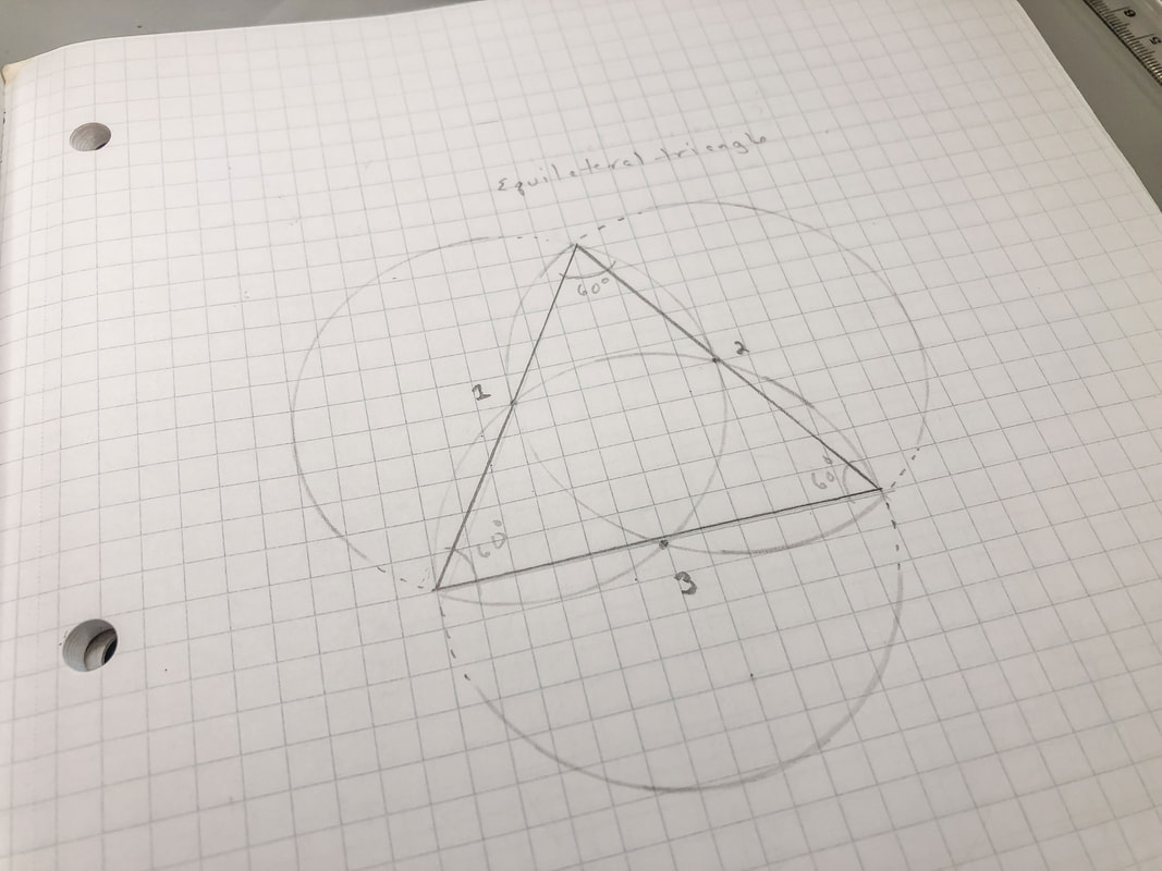 Equilateral triangle made with three circles