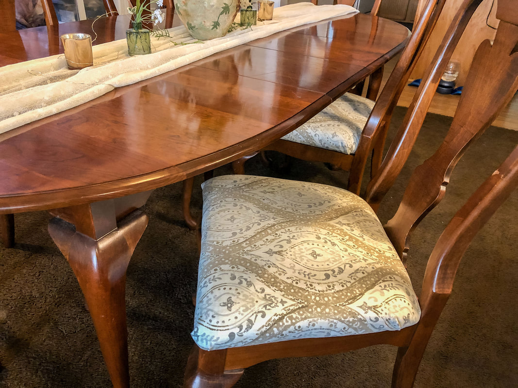 Dining room side chair after a DIY reupholstering project.