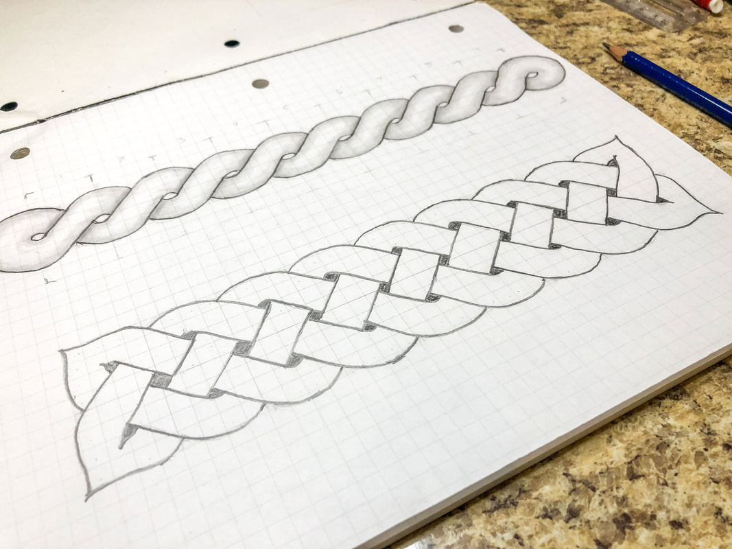 Grid paper with pencil drawn knotwork.