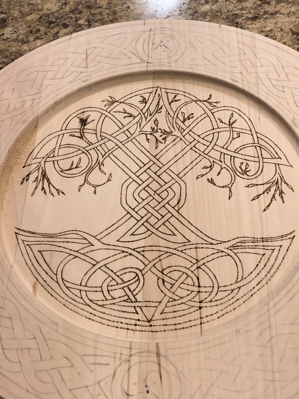 Celtic Tree of Life design progress photo of wood burned plate