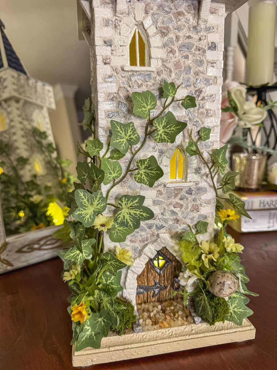 Handmade miniature fairy castle lit with LED lights.