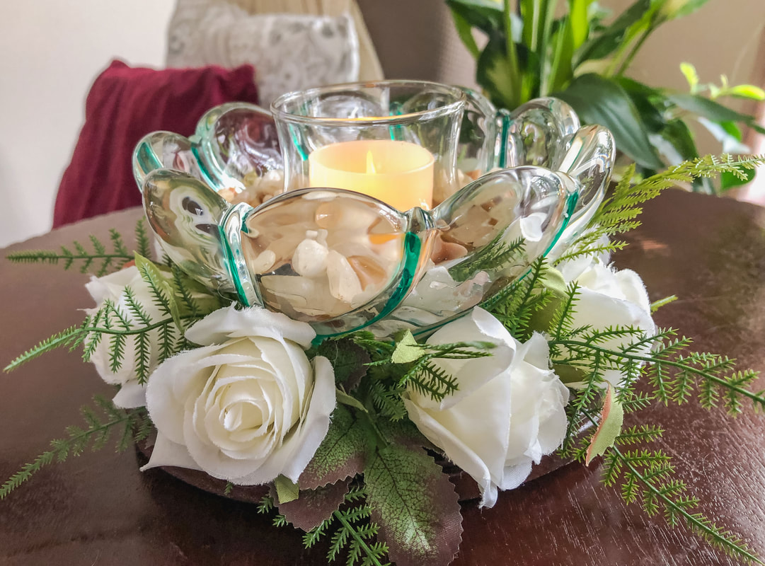 Up-cycled glass bowl with white faux rose candle ring.